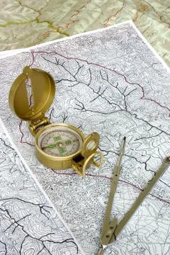 Compass on maps 2 스톡 사진