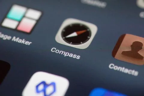 Compass mobile app on a smartphone screen Stock Photos