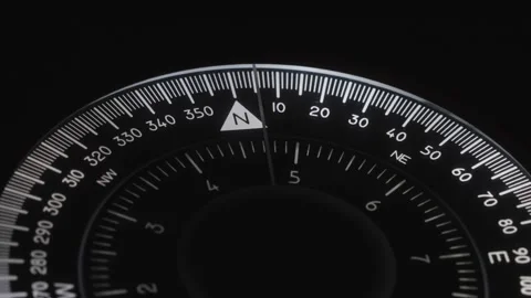 Compass. Needle almost to north. Scale with numbers spinning. Marine ompass Stock Footage 218582785