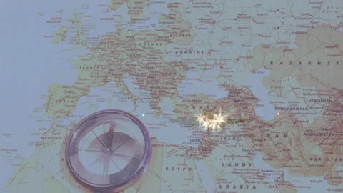 Compass needle twitching northward map sparkling to mark sites near Turkey Stock Footage 313758258
