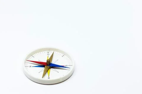 Compass with needle on white background studio light Stock Photos