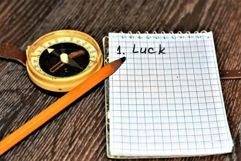 Compass with notepad Stock Photos