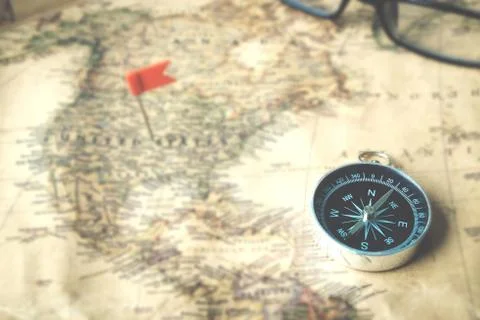 Compass on old map Stock Photos
