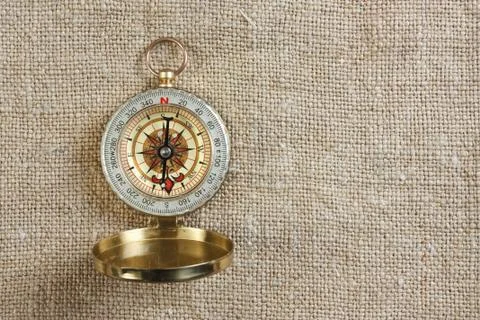 Compass on old sacking Stock Photos