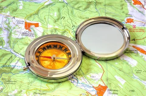 Compass over the map Stock Photos