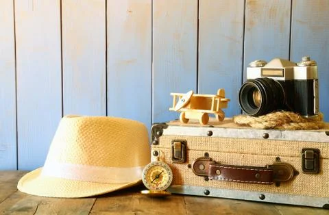 Compass, rope, old camera and toy plane. explorer concept Stock Photos