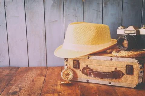Compass, rope, old camera and fedora hat. explorer concept Stock Photos