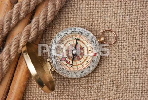 Compass with ropes and bamboo on canvas Stock Photos