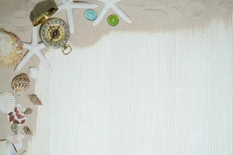 Compass, shells, anchor. Concept of adventure, treasure hunt or world travel. Stock Photos