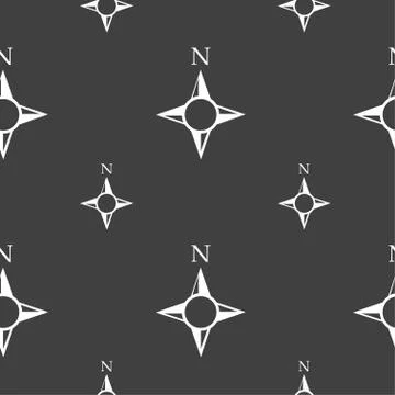 Compass sign icon. Windrose navigation symbol. Seamless pattern on a gray bac Illustrazione stock