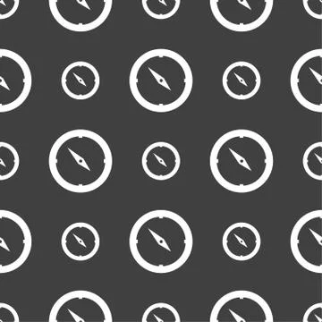 Compass sign icon. Windrose navigation symbol. Seamless pattern on a gray bac Illustrazione stock