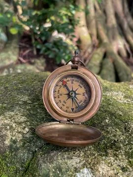 The compass as a symbol of choosing a direction. Stock Photos