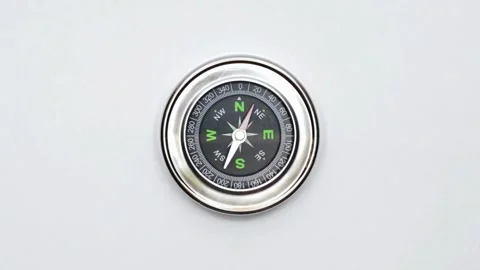 Compass on white background. view of Classic compass isolated, focus on dial. Stock Footage 257869560