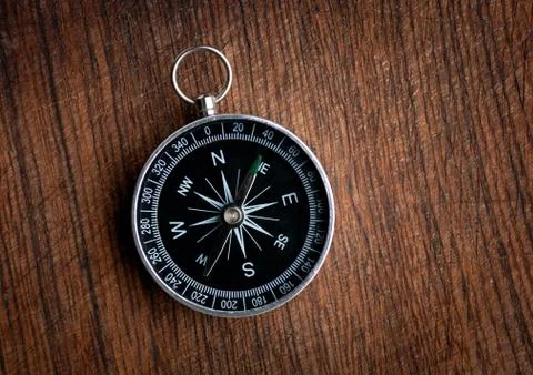 Compass on a wood background Foto stock