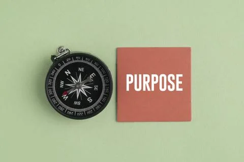 A compass with the word PURPOSE. Purpose Concept: Finding Life Direction, B.. Stock Photos