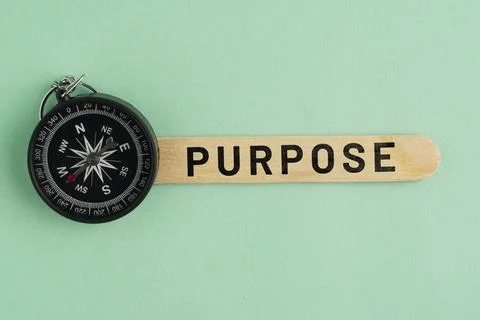A compass with the word PURPOSE. Purpose Concept: Finding Life Direction, B.. Stock Photos