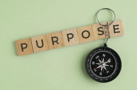 A compass with the word PURPOSE. Purpose Concept: Finding Life Direction, B.. Stock Photos