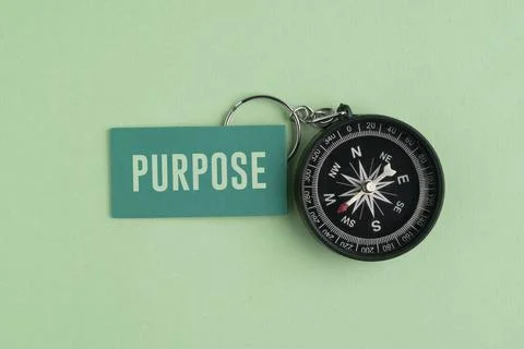 A compass with the word PURPOSE. Purpose Concept: Finding Life Direction, B.. Stock Photos