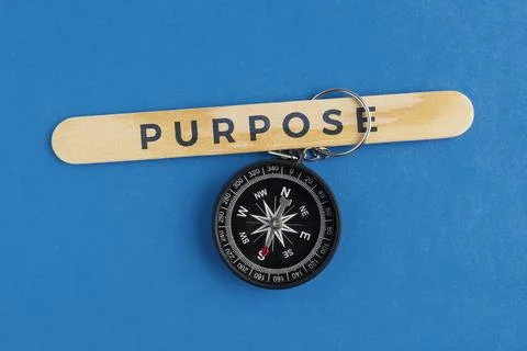 A compass with the word PURPOSE. Purpose Concept: Finding Life Direction, B.. Stock Photos