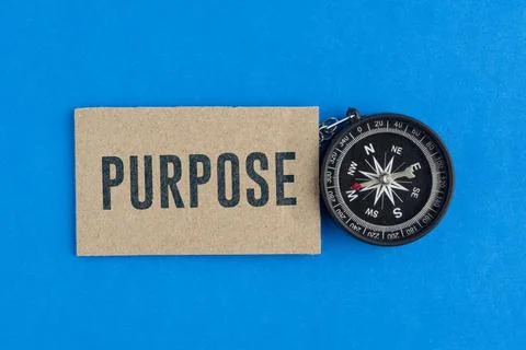 A compass with the word PURPOSE. Purpose Concept: Finding Life Direction, B.. Stock Photos