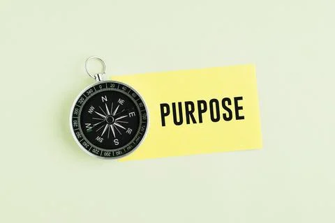 A compass with the word PURPOSE. Purpose Concept: Finding Life Direction, B.. Stock Photos