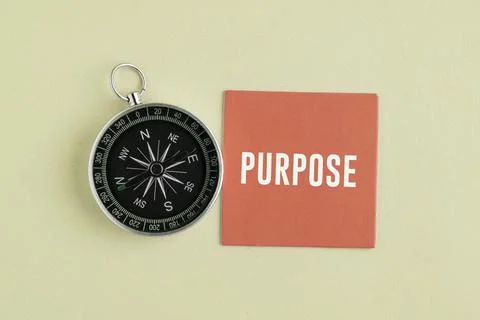 A compass with the word PURPOSE. Purpose Concept: Finding Life Direction, B.. Stock Photos