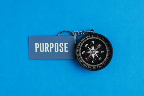 A compass with the word PURPOSE. Purpose Concept: Finding Life Direction, B.. Stock Photos