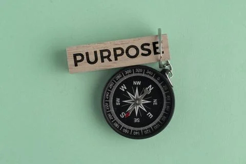 A compass with the word PURPOSE. Purpose Concept: Finding Life Direction, B.. Stock Photos