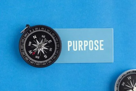 A compass with the word PURPOSE. Purpose Concept: Finding Life Direction, B.. Stock Photos