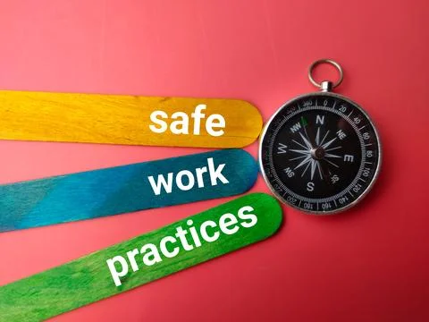 Compass with the words safe work practices on red background Stock Photos