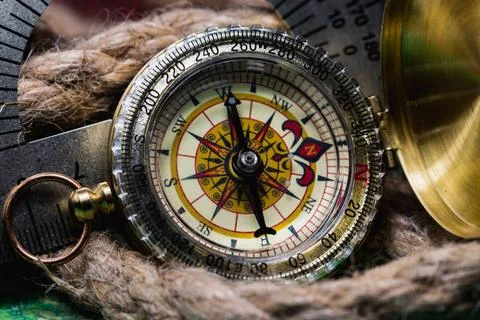 Compass on the world map compass lies on an ancient world map Copyright: x... Stock Photos