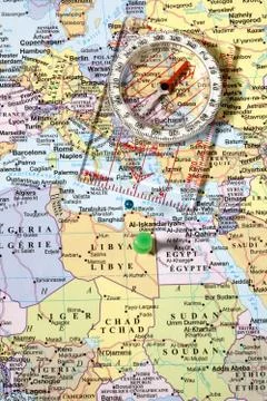 Compass on world map Stock Photos