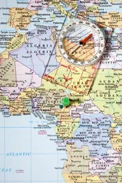 Compass on world map Stock Photos