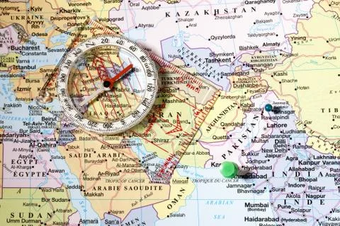 Compass on world map Stock Photos
