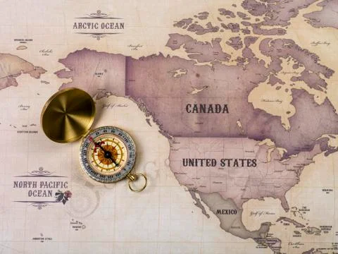 Compass with world map Stock Photos