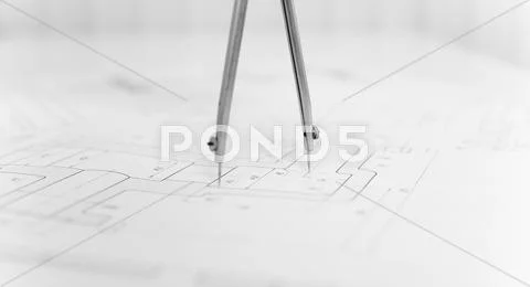 Compasses and drawing close up Stock Photos