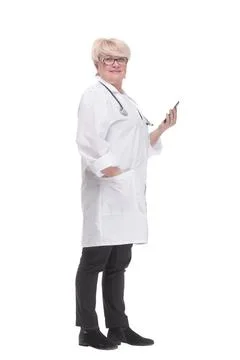 Competent doctor using a digital tablet. isolated on a white 스톡 사진