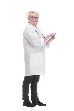 Competent doctor using a digital tablet. isolated on a white Foto stock