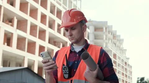 Competent supervisor controlling work at construction site outside Stock Photos