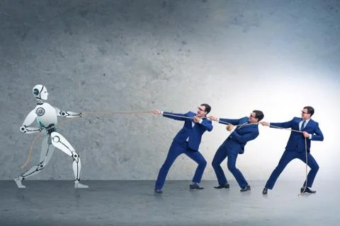 Competition between humans and robots in tug of war concept 스톡 사진