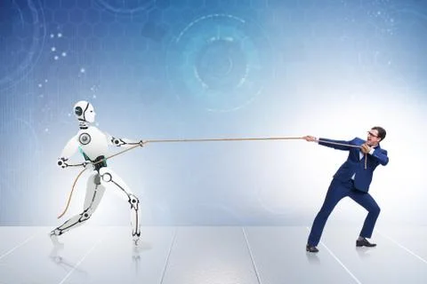 Competition between humans and robots in tug of war concept 스톡 사진