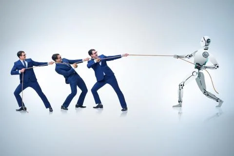 Competition between humans and robots in tug of war concept 스톡 사진