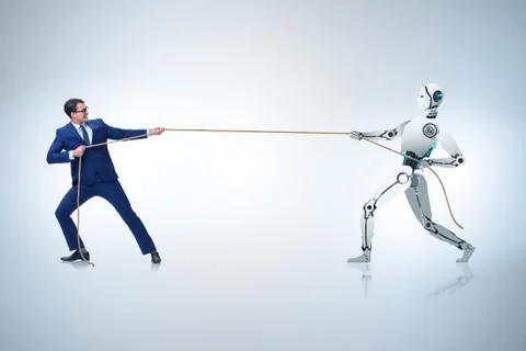 Competition between humans and robots in tug of war concept 스톡 사진