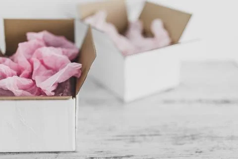 Competition concept, delivery parcel boxes side by side with slightly differe Stock Photos