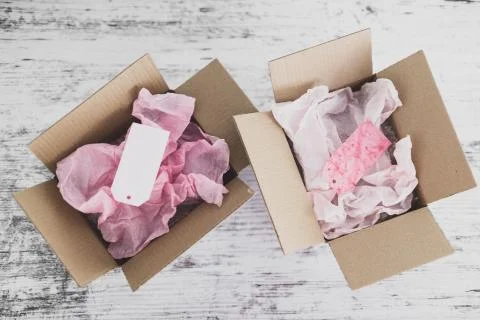 Competition concept, delivery parcel boxes side by side with slightly differe Stock Photos
