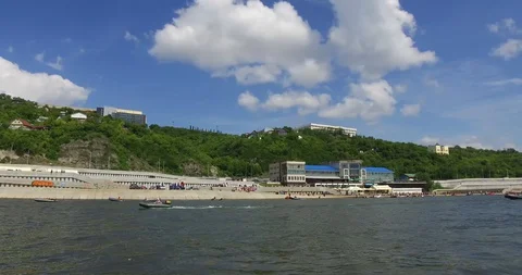 Competition for high-speed motor boats on the quay of the resort town. Stock Footage 127794591