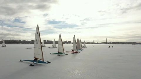 Competition of ice-boats in winter Stock Footage 122697650