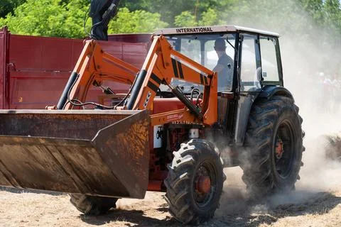 Competition in log pulling with tractors Stock Photos