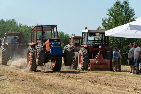 Competition in log pulling with tractors Stock Photos