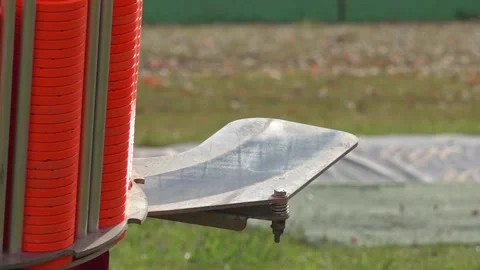 Competition plate throwing machine running - 121 Stock Footage 310196443